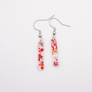 Red and White Glitter .5” Resin Earrings with silver Hardware